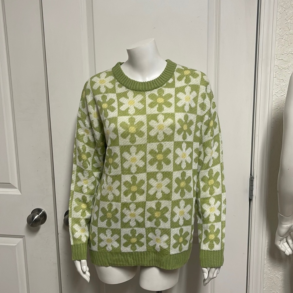 Green and white sweater